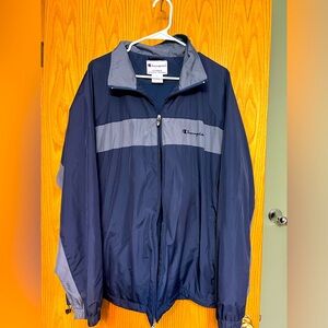 Champion windbreaker. Needs a new zipper.